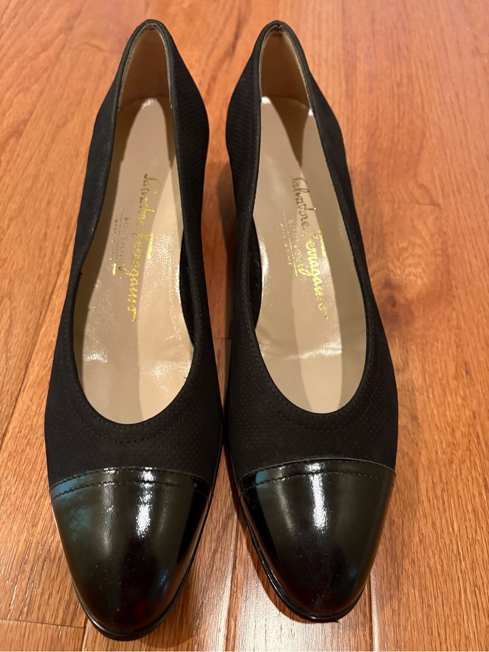 Salvatore Ferragamo Black Slightly Wedged Pumps with Glossy Black Patent Cap Toe